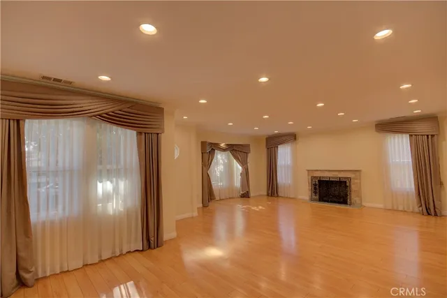 a view of a livingroom with furniture and a fireplace