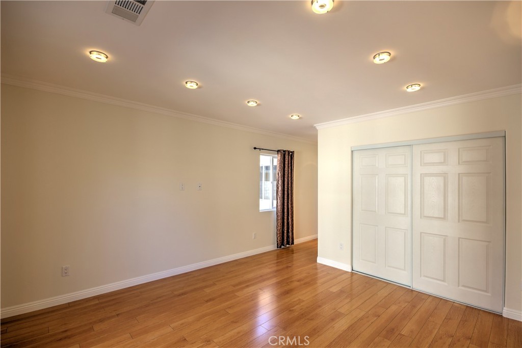 1367 East Windsor Road Glendale, CA 91205 - Photo 9 of 21 a view of an empty room with wooden floor