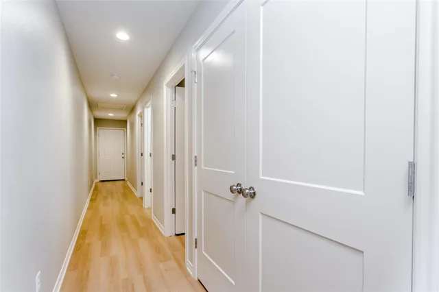 a view of a bathroom with a bathtub