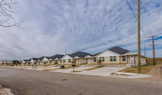 a view of street with houses