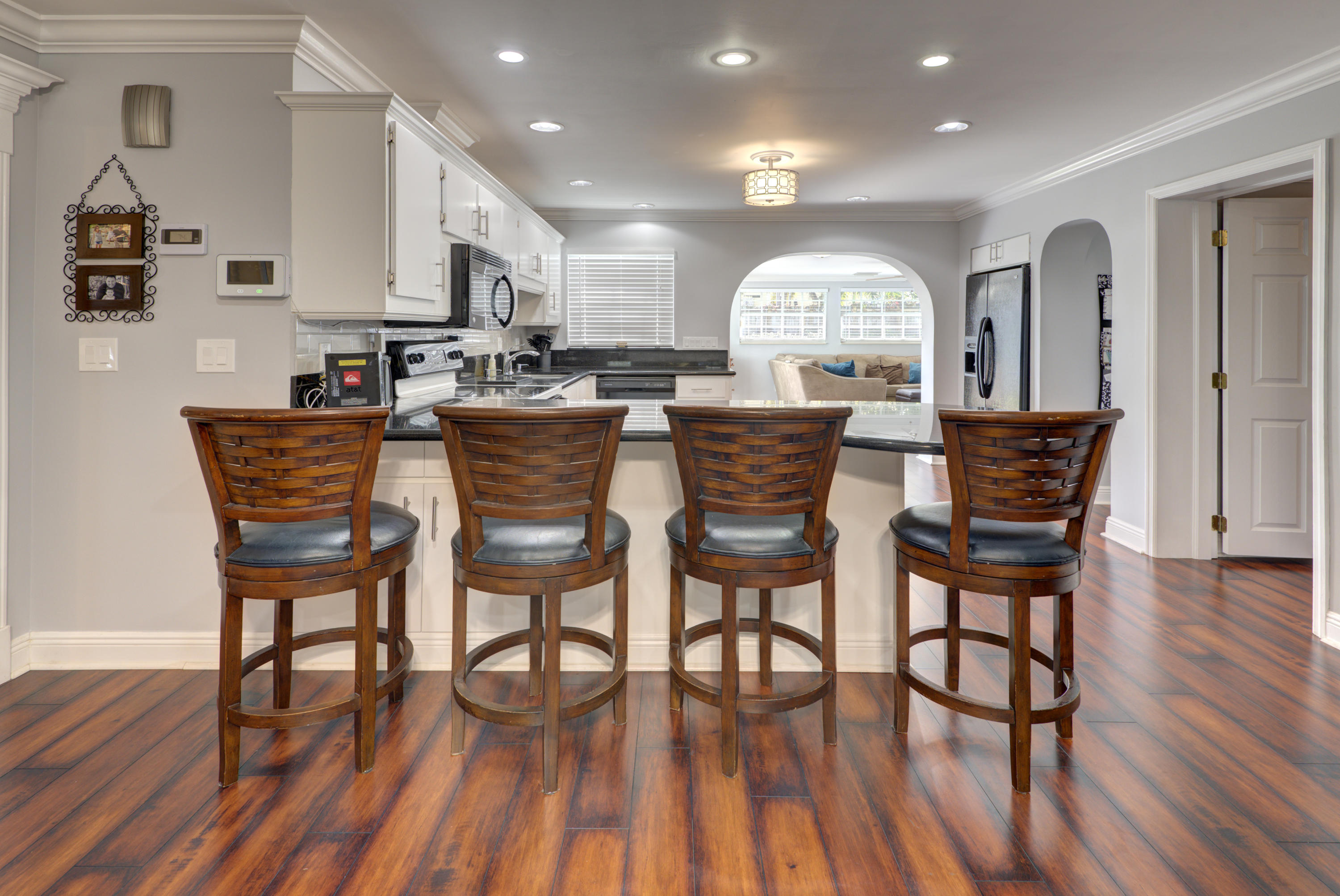276 Northwest 7th Street Boca Raton, FL 33432 - Photo 6 of 28 a view of a a dining room with furniture window and wooden floor