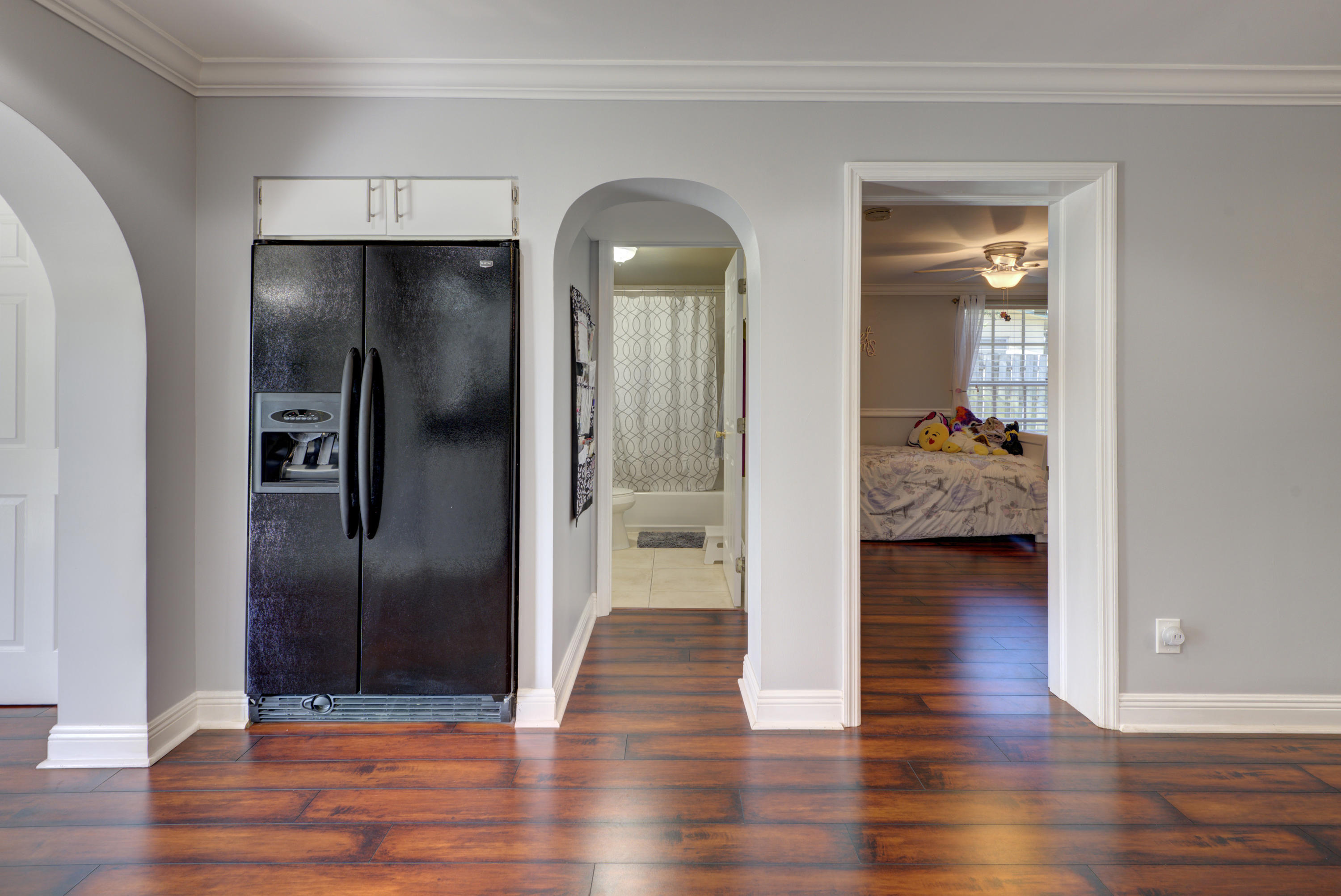 276 Northwest 7th Street Boca Raton, FL 33432 - Photo 8 of 28 a view of a hallway with wooden floor and closet