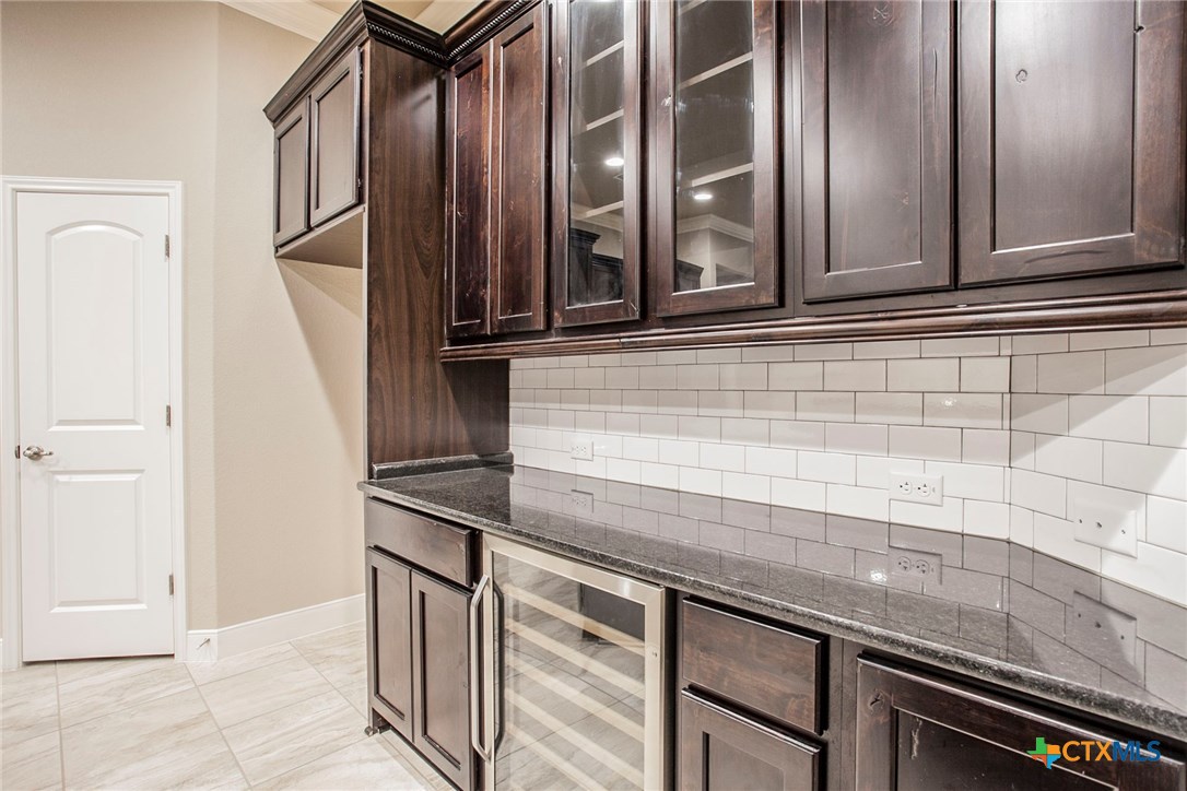 549 Wills Point Way Belton, TX 76513 - Photo 5 of 31 a kitchen with a sink and cabinets