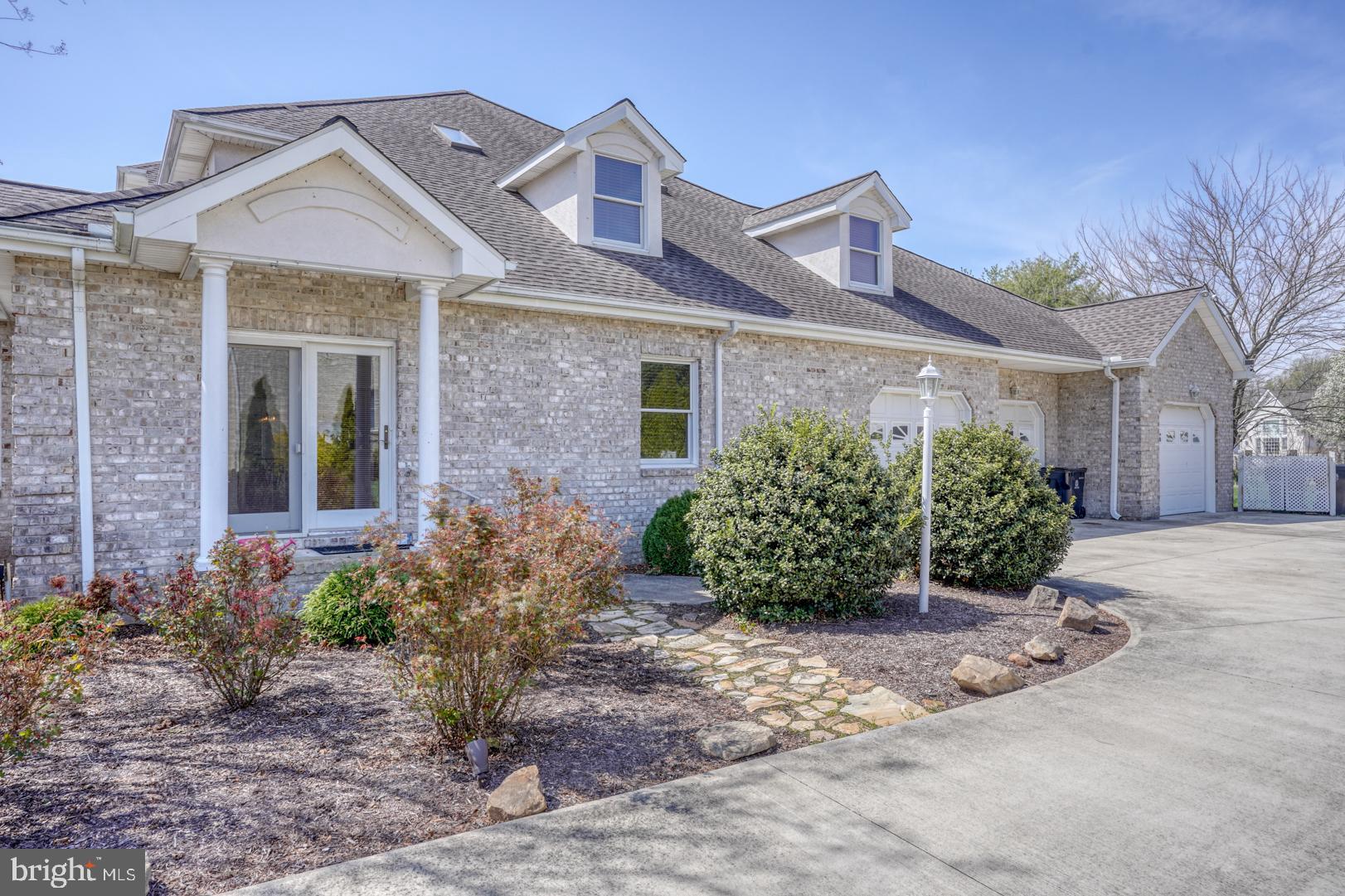 34 Chadwick Drive Dover, DE 19901 - Photo 12 of 59 a front view of a house with garden