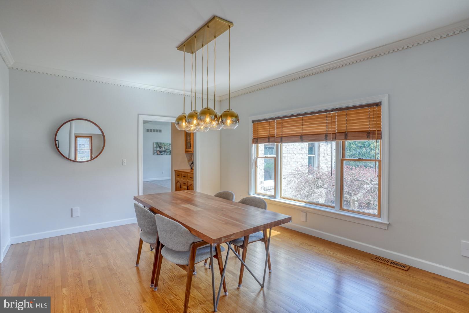 34 Chadwick Drive Dover, DE 19901 - Photo 18 of 59 a view of a dining room with furniture window and wooden floor