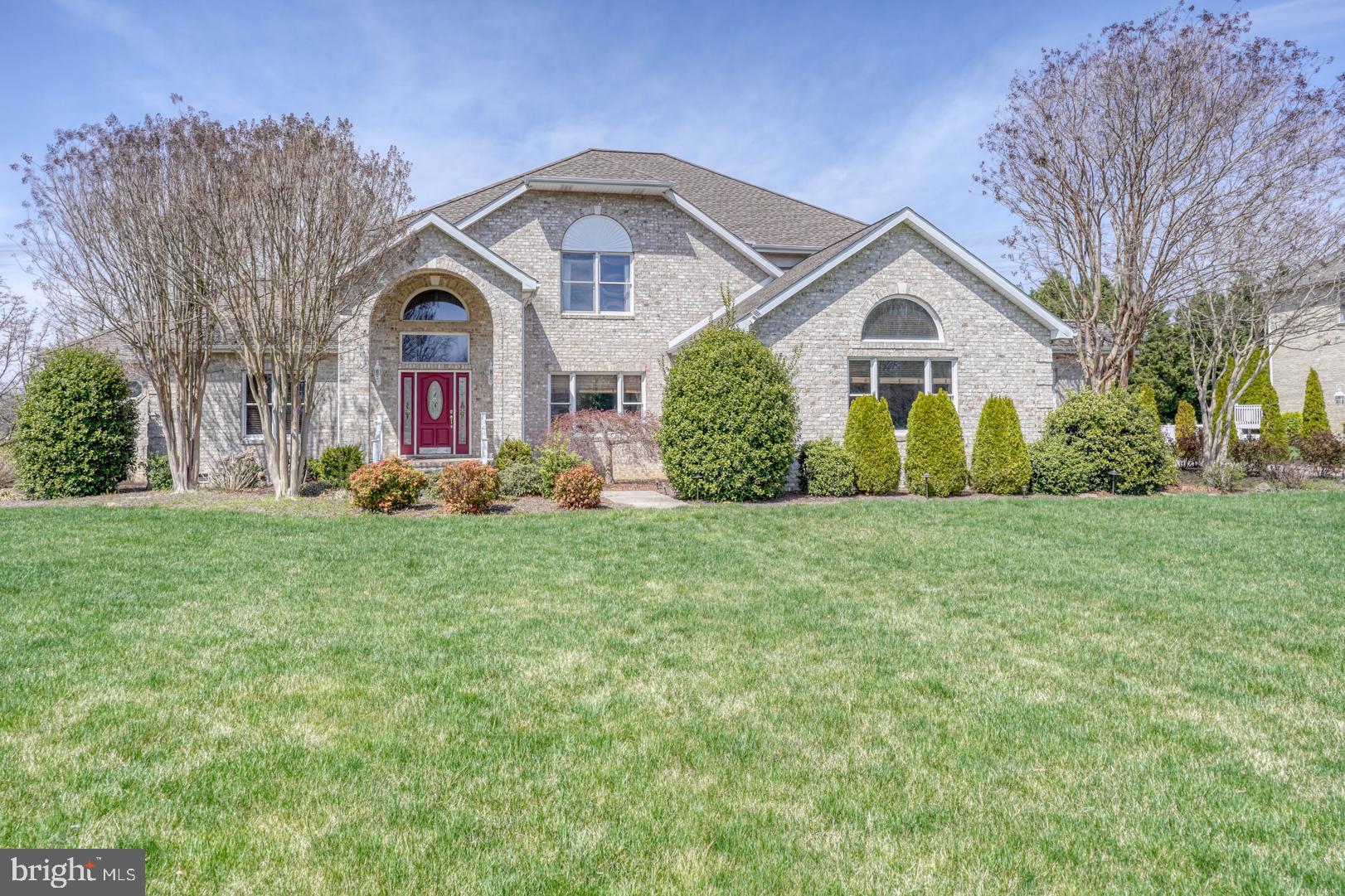 34 Chadwick Drive Dover, DE 19901 - Photo 2 of 59 a front view of a house with garden