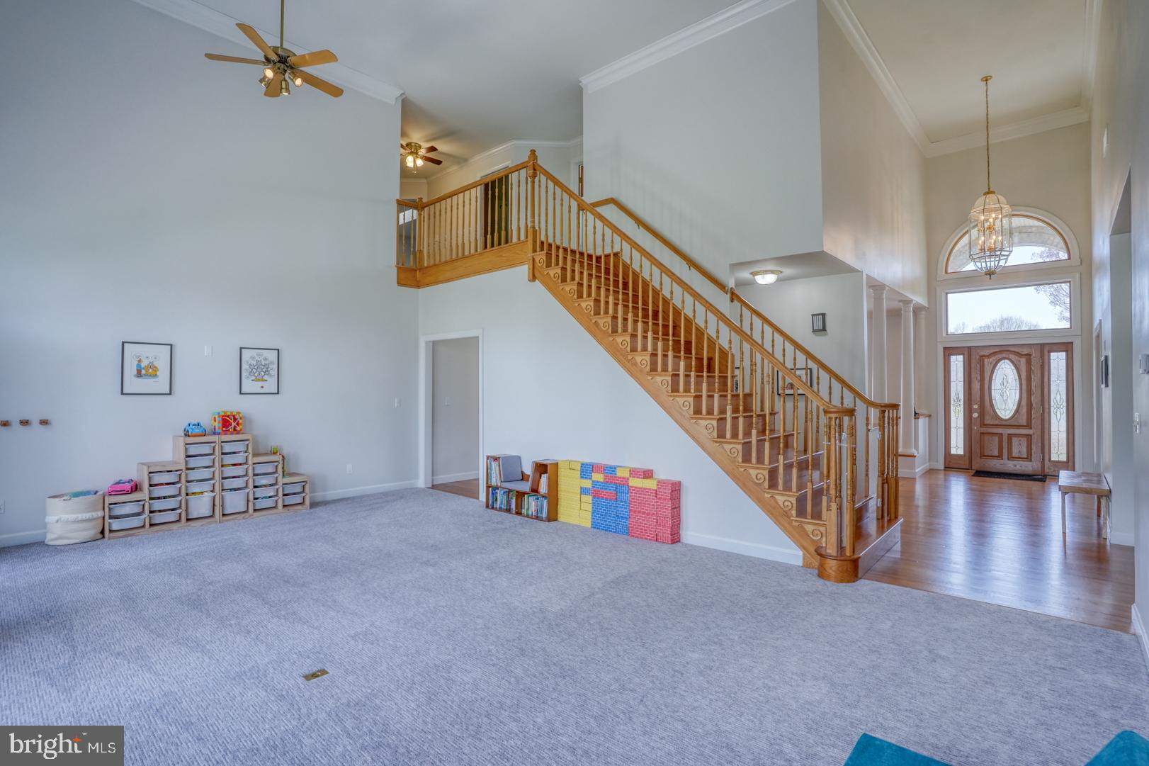 34 Chadwick Drive Dover, DE 19901 - Photo 25 of 59 a view of staircase and living room with stairs