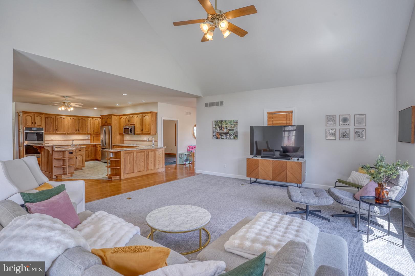 34 Chadwick Drive Dover, DE 19901 - Photo 26 of 59 a living room with furniture and a wooden floor