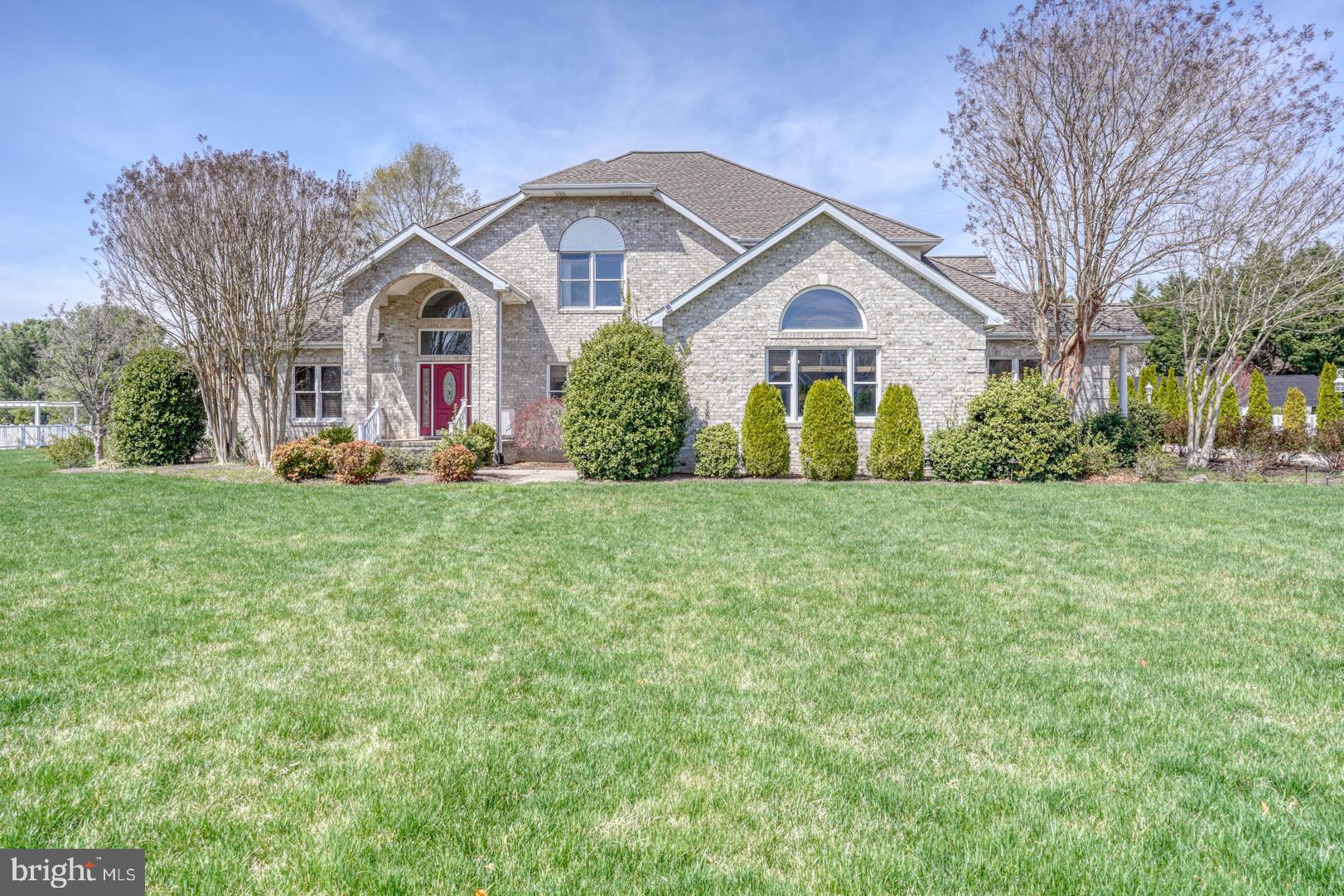 34 Chadwick Drive Dover, DE 19901 - Photo 3 of 59 a front view of a house with a yard