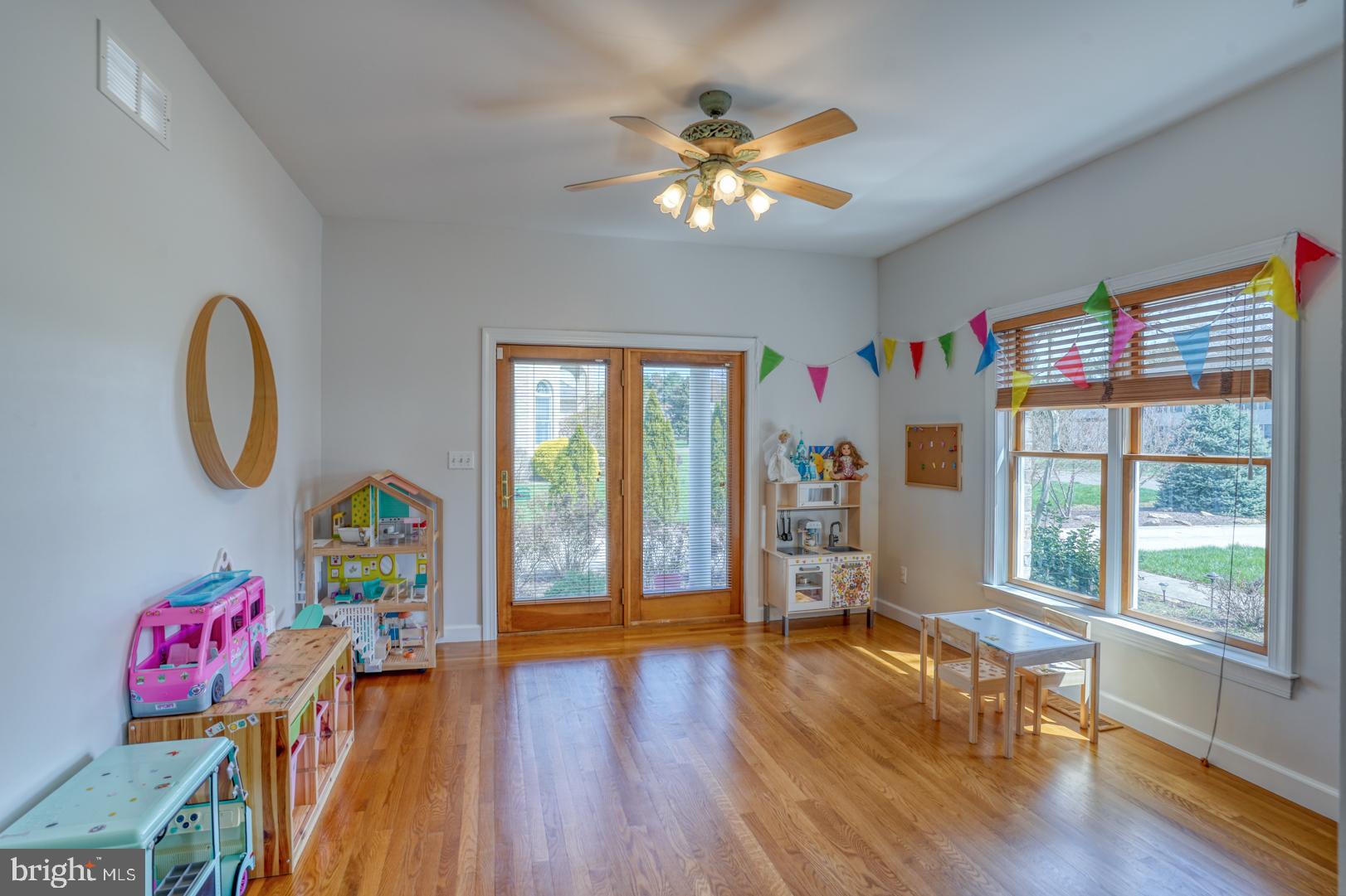 34 Chadwick Drive Dover, DE 19901 - Photo 31 of 59 a living room with furniture and a wooden floor