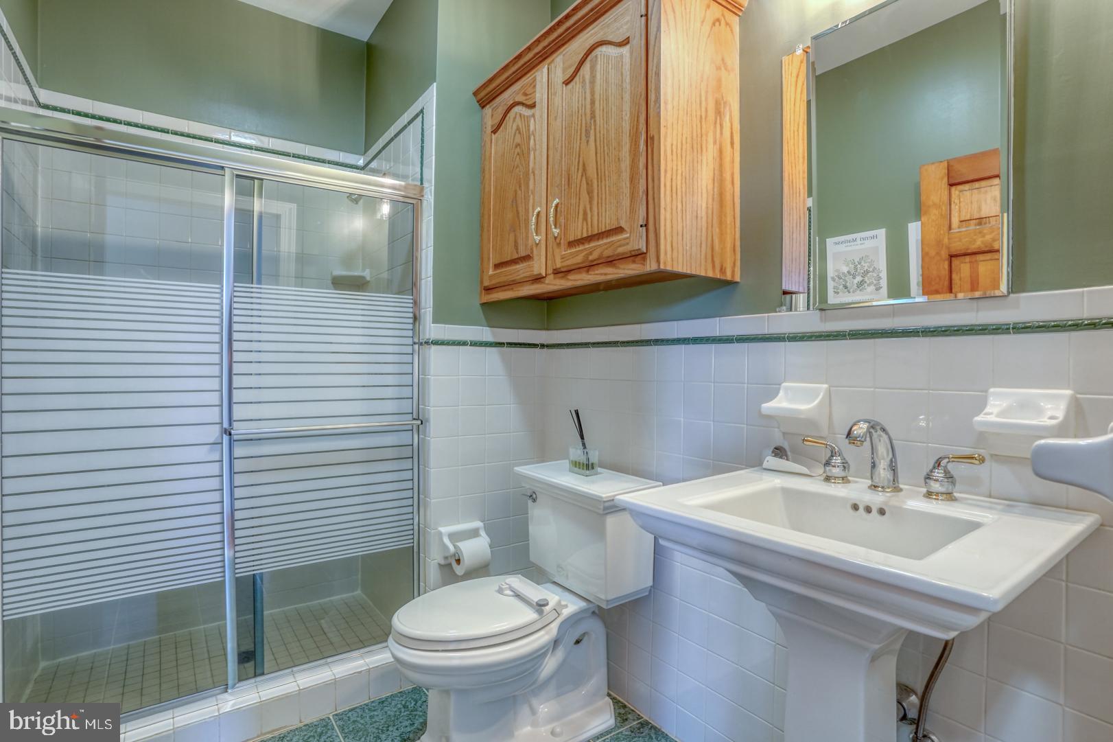34 Chadwick Drive Dover, DE 19901 - Photo 46 of 59 a bathroom with a sink a toilet and mirror
