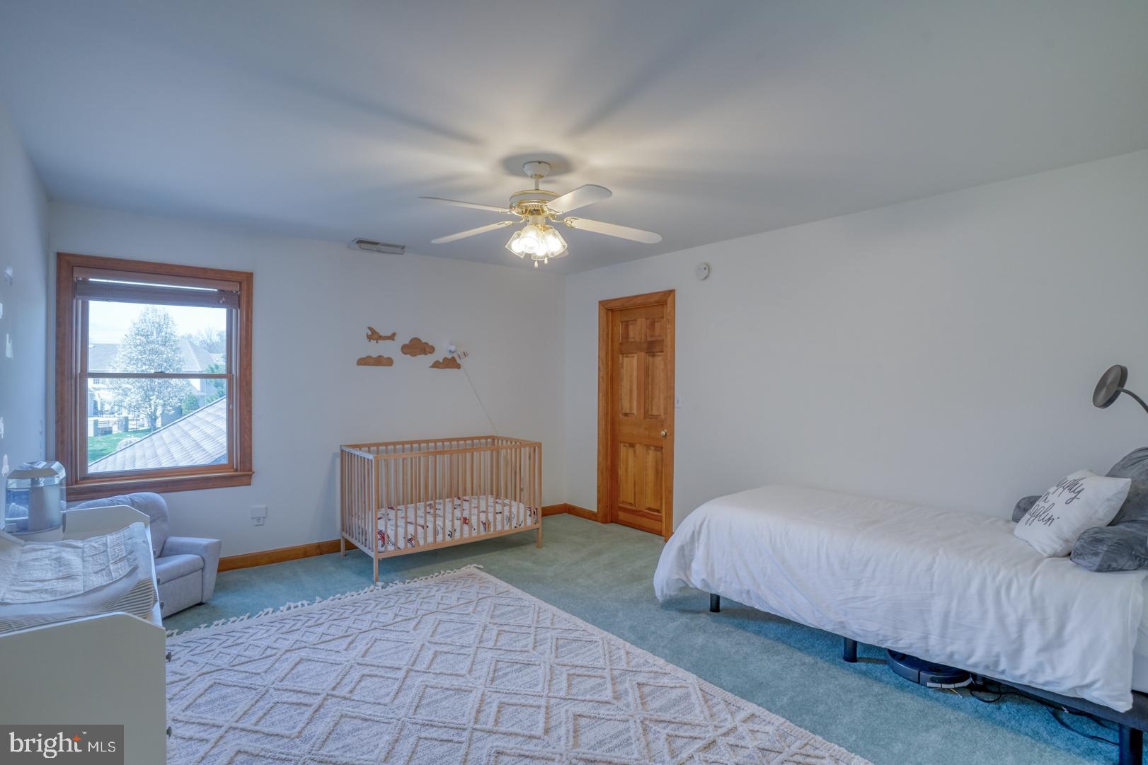 34 Chadwick Drive Dover, DE 19901 - Photo 49 of 59 a bedroom with a bed and a window