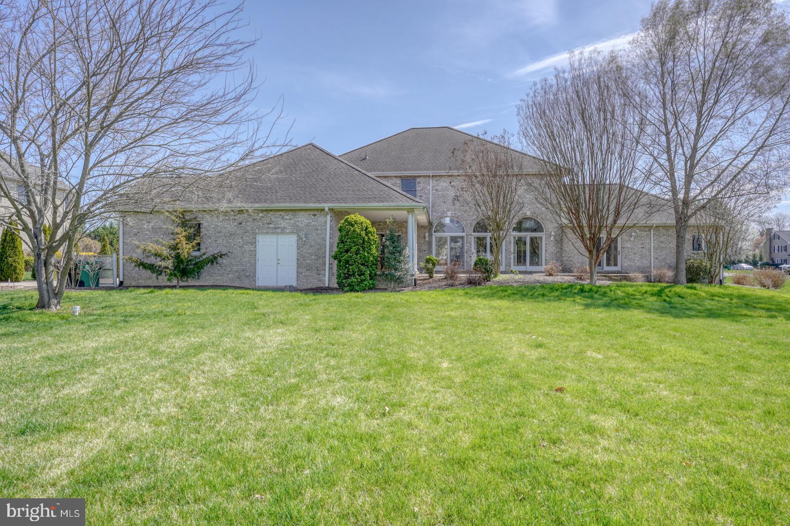 34 Chadwick Drive Dover, DE 19901 - Photo 10 of 59 a front view of house with yard and green space