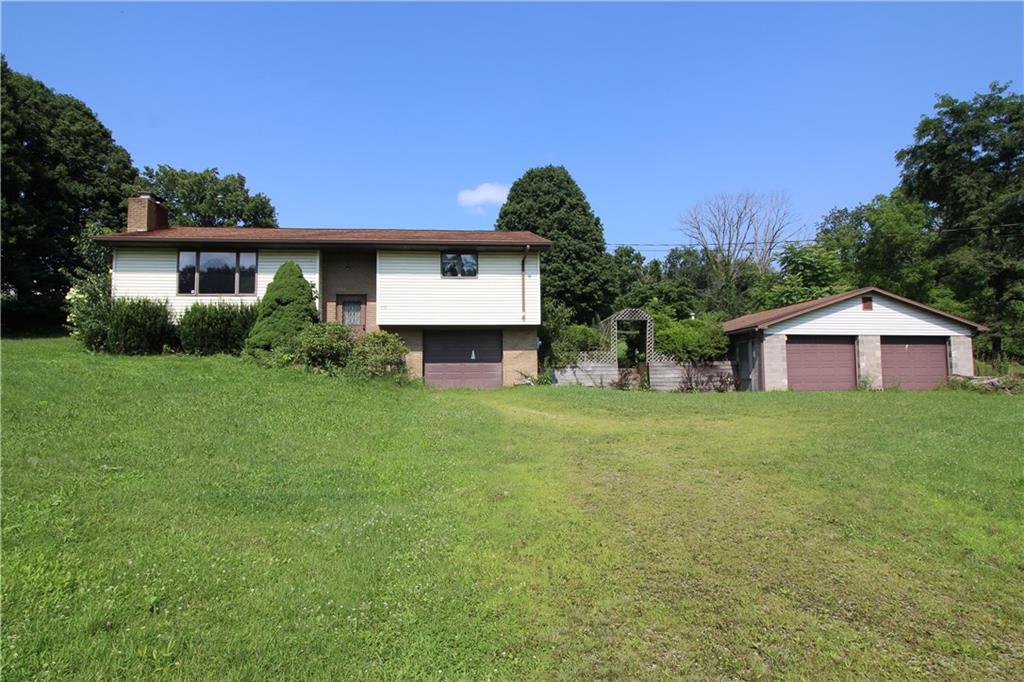236 Brownlee Road Eighty Four, PA 15330 - Photo 1 of 25 Beautiful Country Setting seconds to I-70, minutes to PA 43 & I-79, just South of Washington. Convenient 2 Car Detached Garage pus 1 Car Integral situated on just under 1 Acre of Property