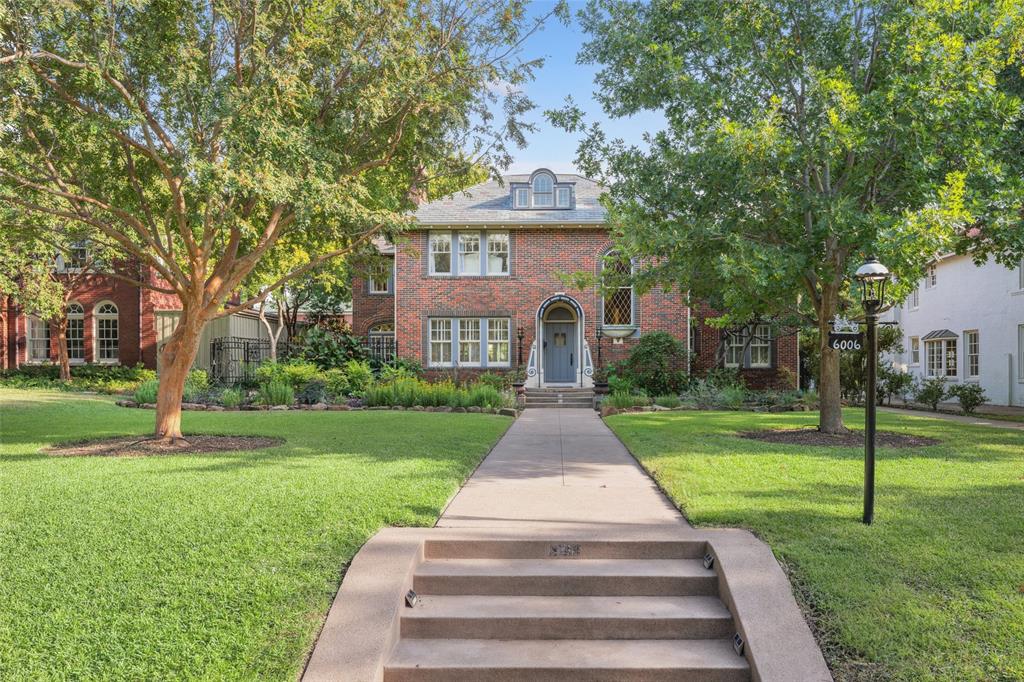 6006 Swiss Avenue Dallas, TX 75214 - Photo 1 of 1 a front view of a house with a yard