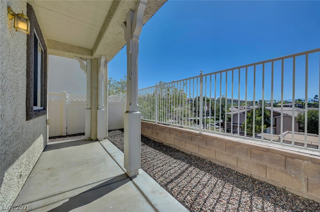 977 Sparkling Light Street Henderson, NV 89052 - Photo 60 of 75 This inviting porch offers tranquil views, perfect for enjoying peaceful moments outdoors.