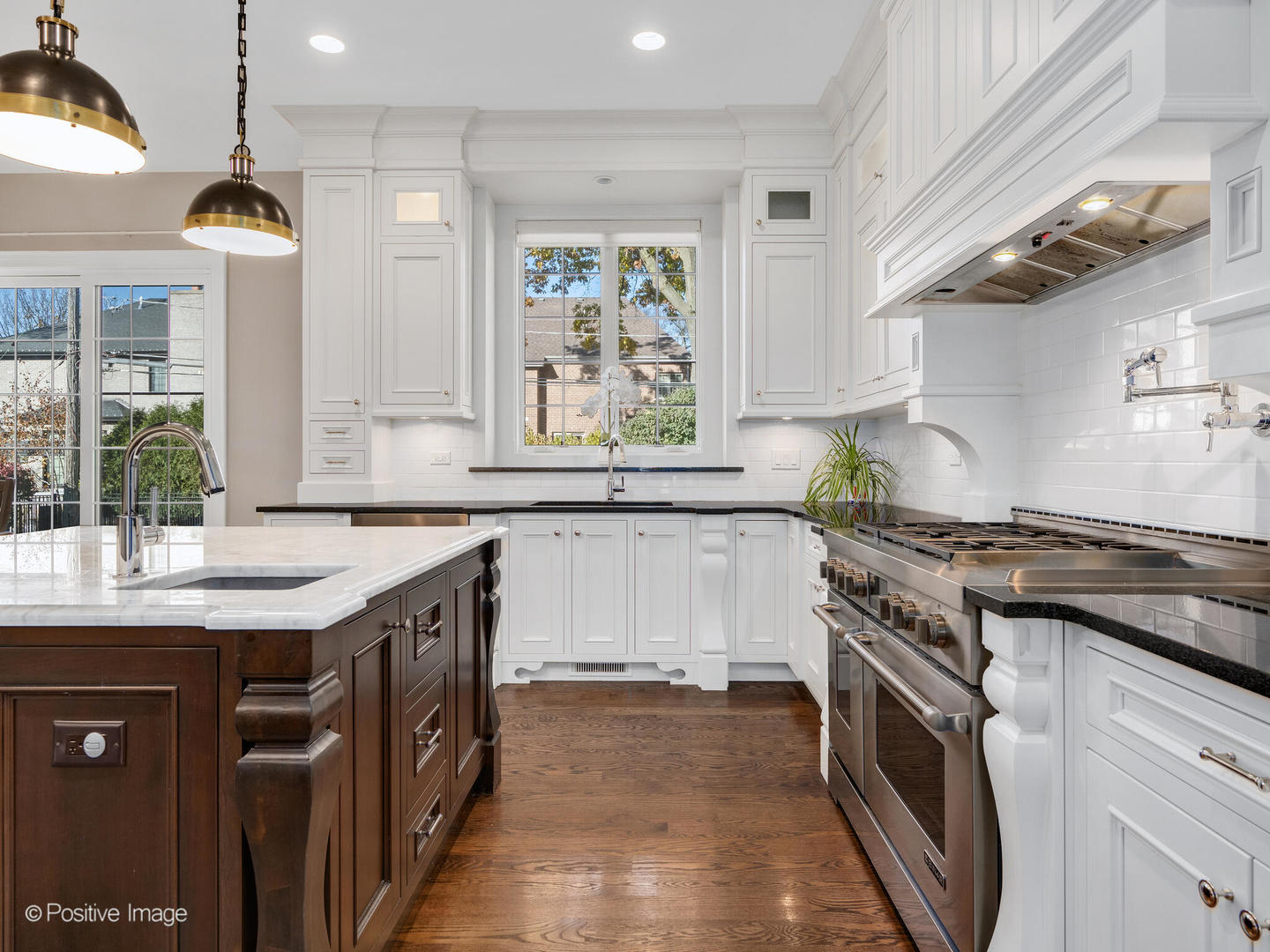 109 East Madison Street Elmhurst, IL 60126 - Photo 13 of 56 a kitchen with granite countertop a sink and a stove