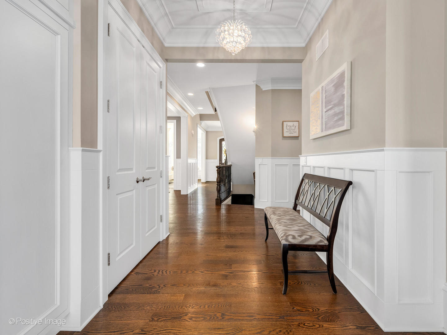 109 East Madison Street Elmhurst, IL 60126 - Photo 21 of 56 a view of a hallway with wooden floor windows and a livingroom