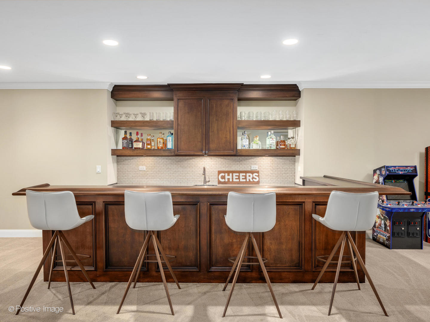 109 East Madison Street Elmhurst, IL 60126 - Photo 44 of 56 a kitchen with stainless steel appliances granite countertop a table chairs stove and cabinets