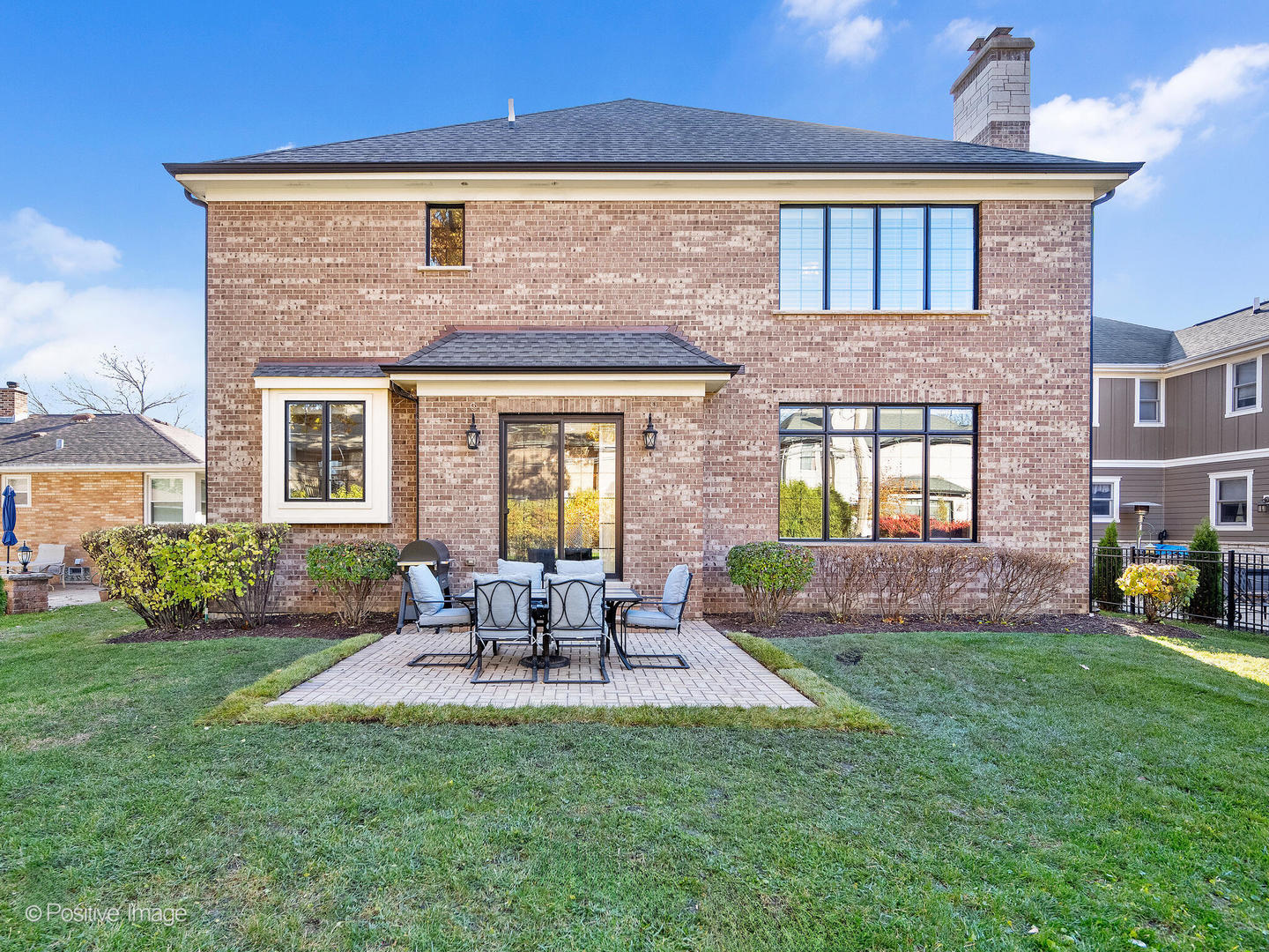 109 East Madison Street Elmhurst, IL 60126 - Photo 49 of 56 a front view of a house with patio and garden