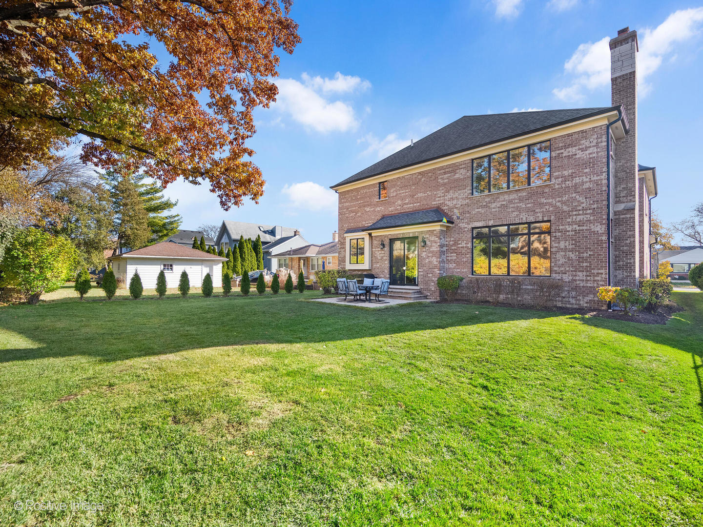 109 East Madison Street Elmhurst, IL 60126 - Photo 51 of 56 a front view of a house with garden