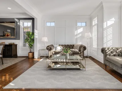 a kitchen with granite countertop a sink and a stove