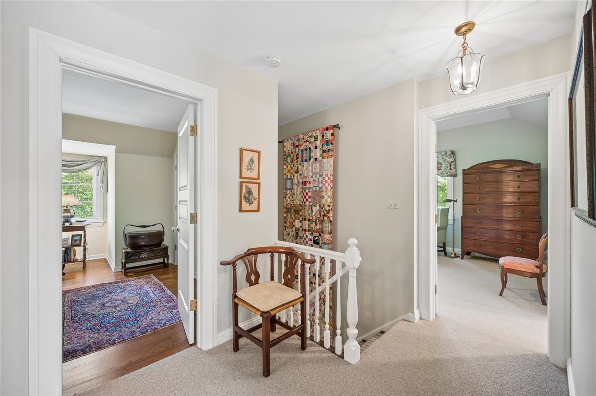 253 Summerfield Road Northbrook, IL 60062 - Photo 33 of 46 a balcony with furniture and a rug
