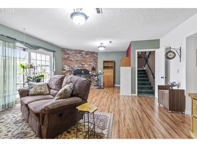 a kitchen with stainless steel appliances granite countertop a sink and cabinets