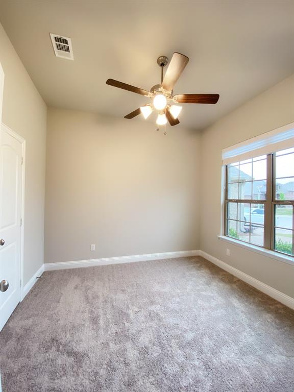 3101 Razorback Street Melissa, TX 75454 - Photo 28 of 40 a view of an empty room with a window