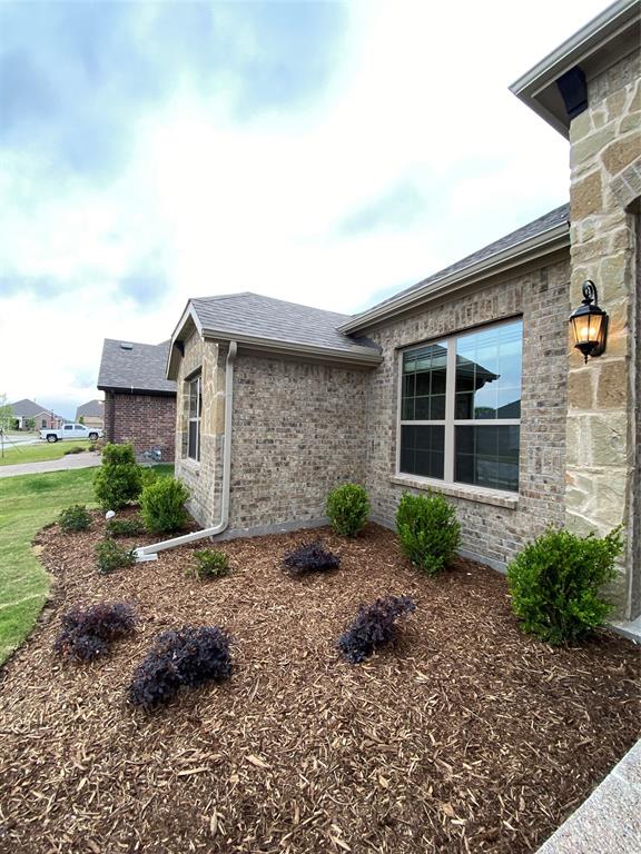 3101 Razorback Street Melissa, TX 75454 - Photo 34 of 40 a front view of a house with a yard