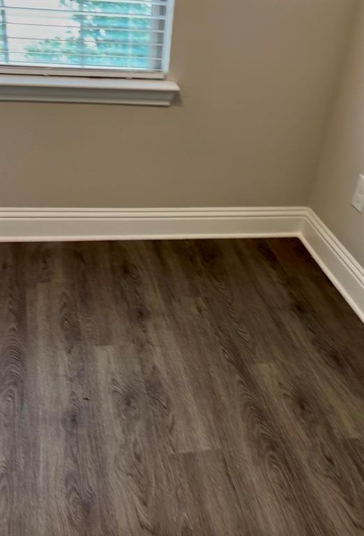 3101 Razorback Street Melissa, TX 75454 - Photo 40 of 40 a view of a small space with wooden floor and a window
