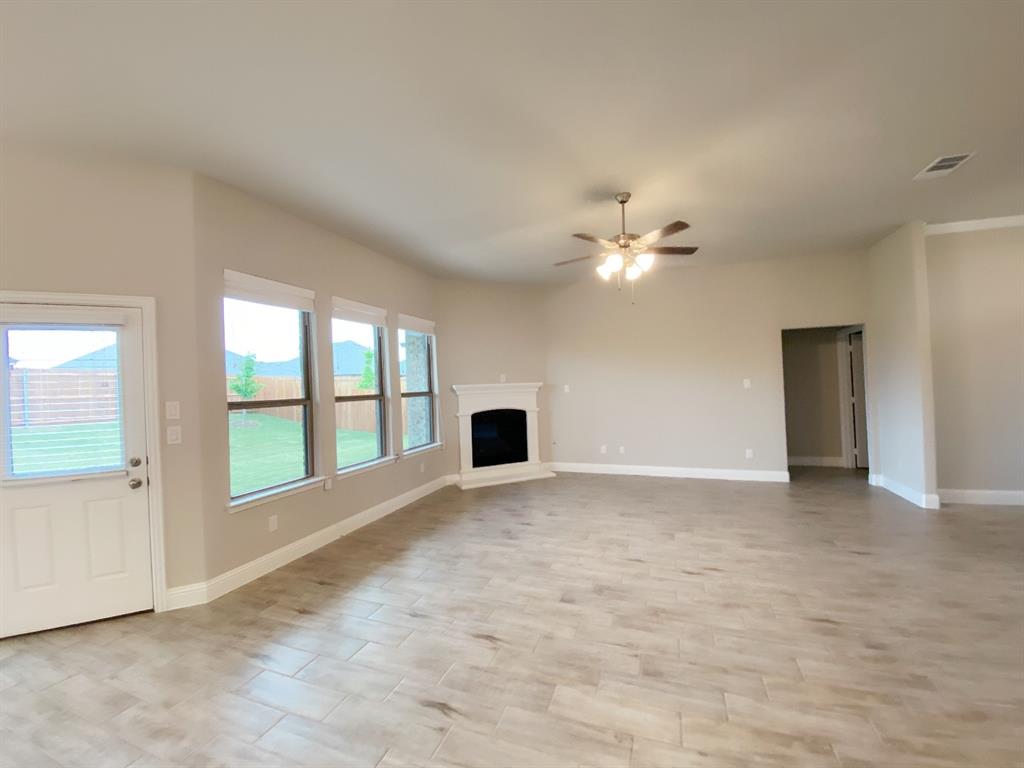 3101 Razorback Street Melissa, TX 75454 - Photo 9 of 40 a view of an empty room with a window