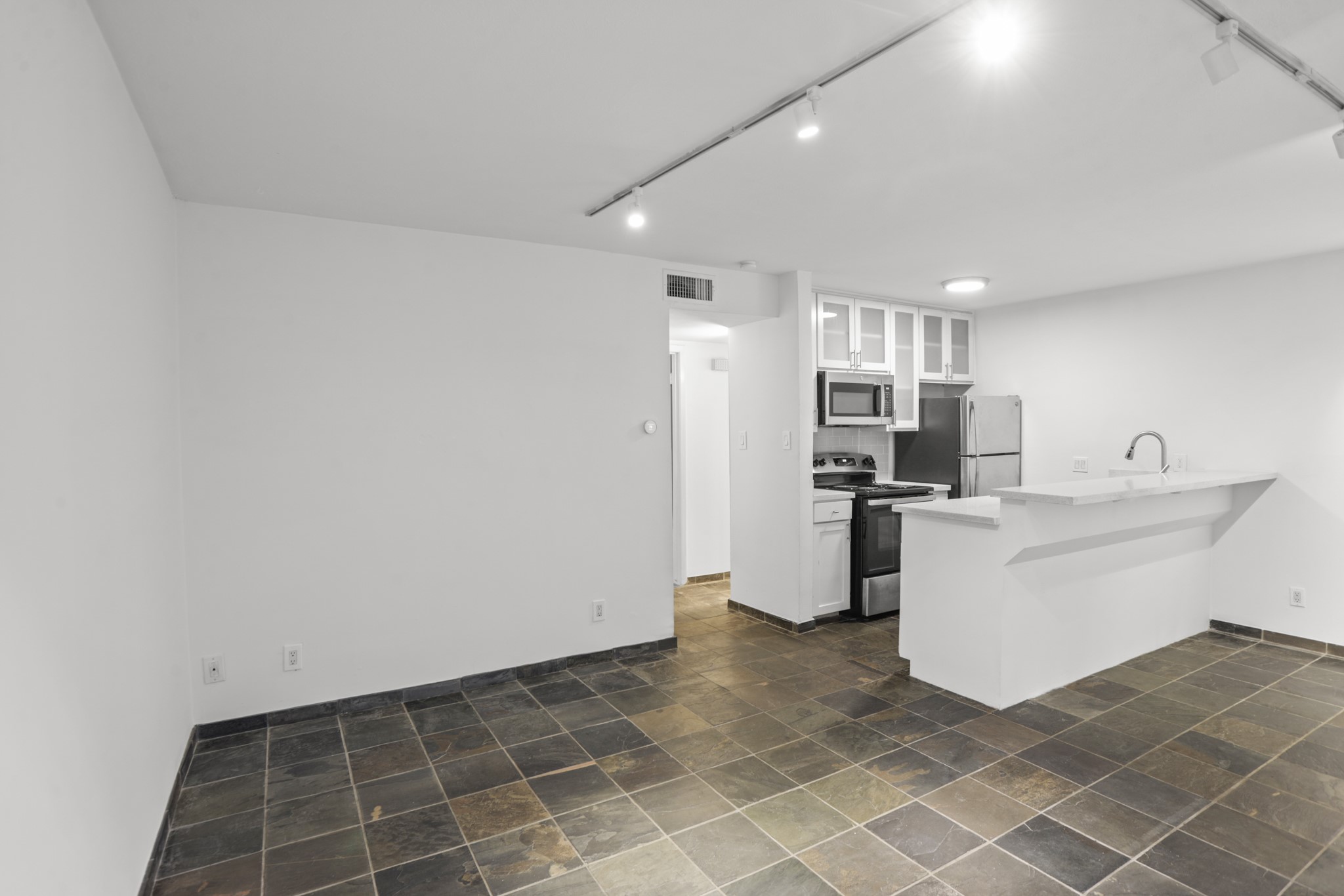 3602 Garrott Street, Unit 16 Houston, TX 77006 - Photo 15 of 34 Another view of the open living, dining and kitchen.