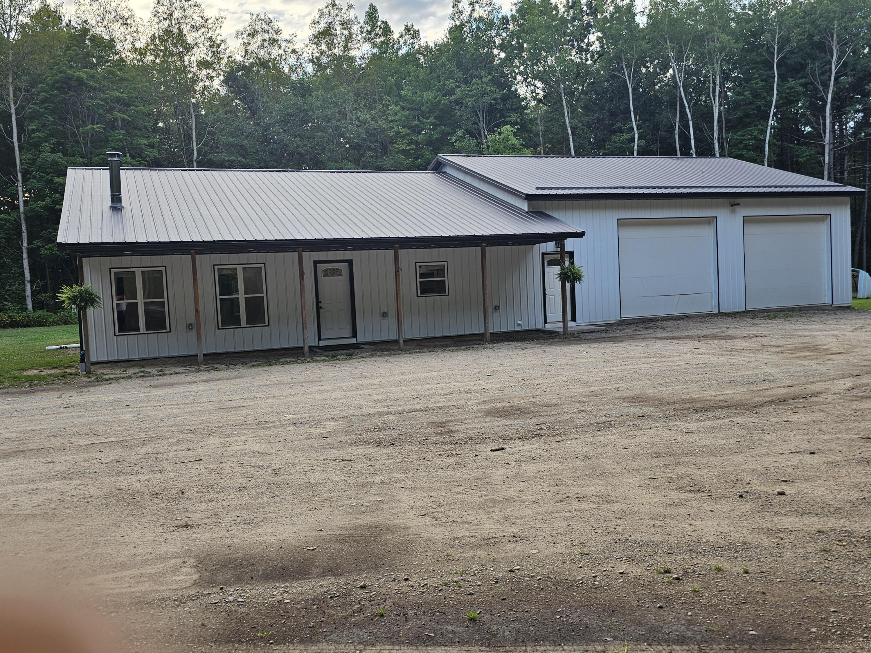 11122 Evergreen Road Gowen, MI 49326 - Photo 1 of 44 Front shot