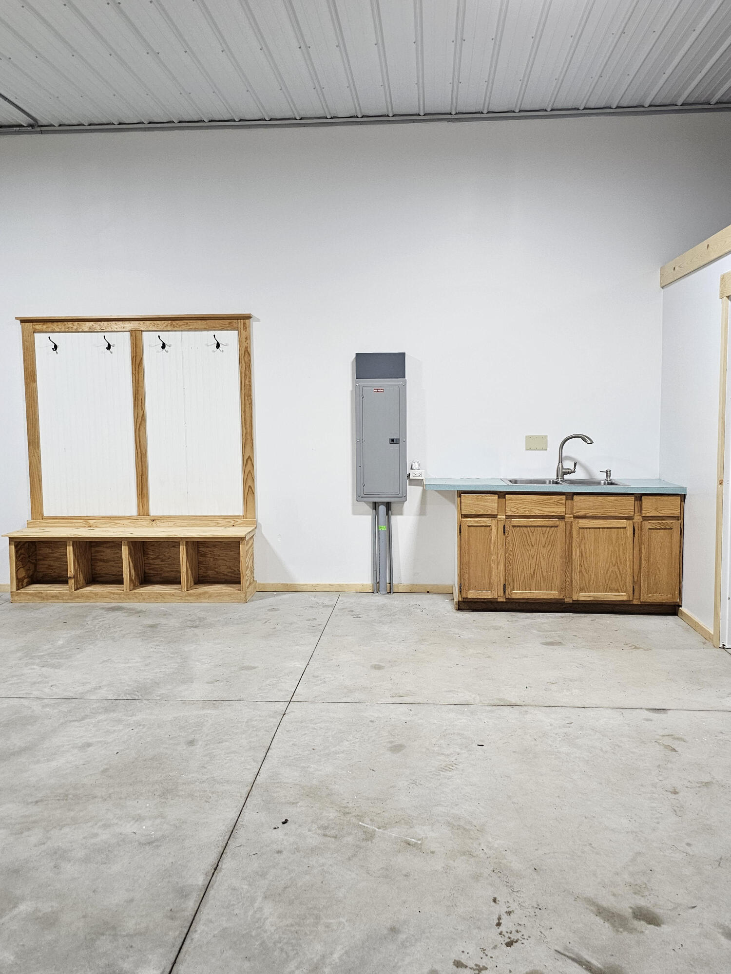11122 Evergreen Road Gowen, MI 49326 - Photo 38 of 44 garage full on counter & storage good
