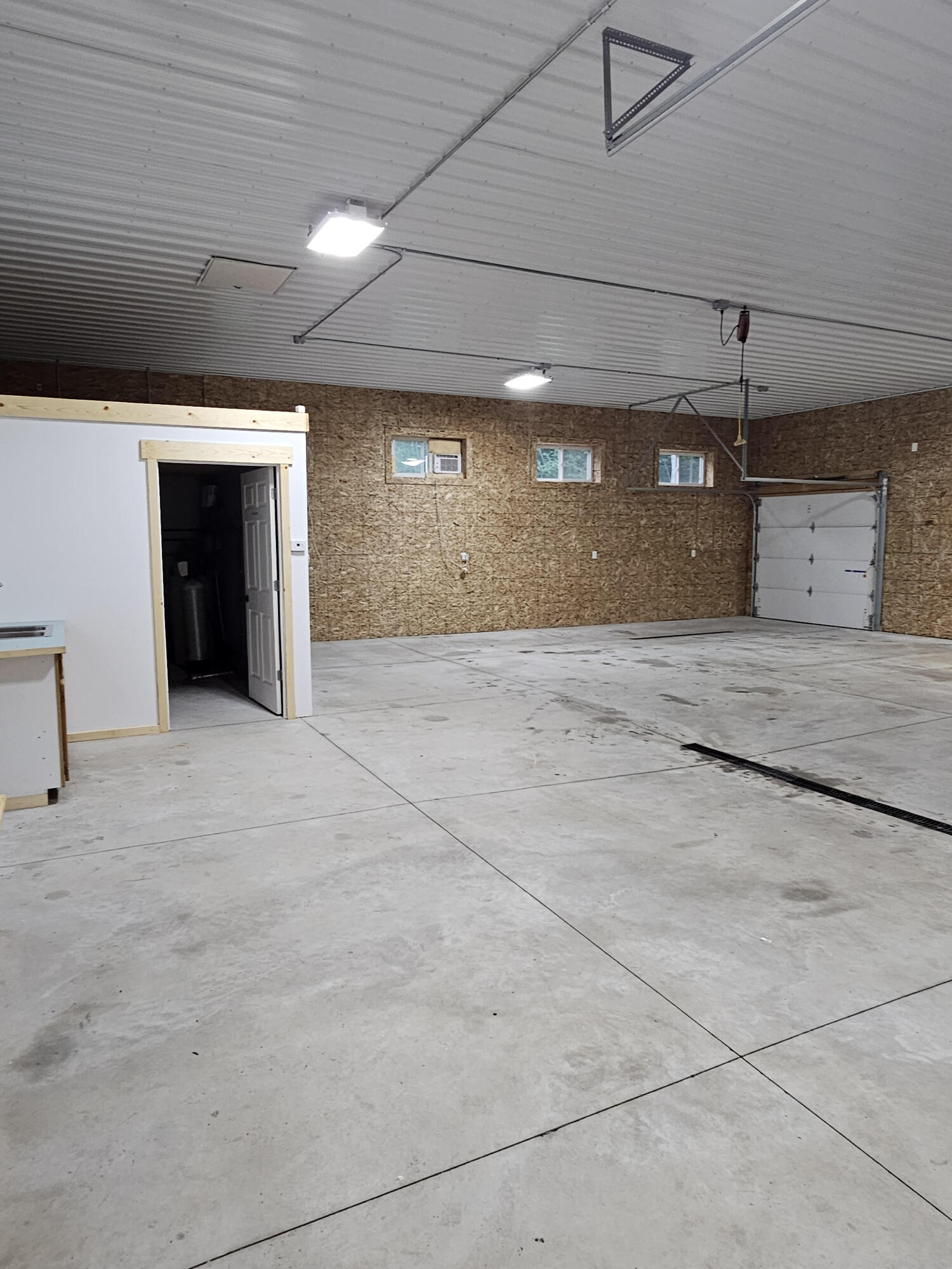 11122 Evergreen Road Gowen, MI 49326 - Photo 39 of 44 garage open look