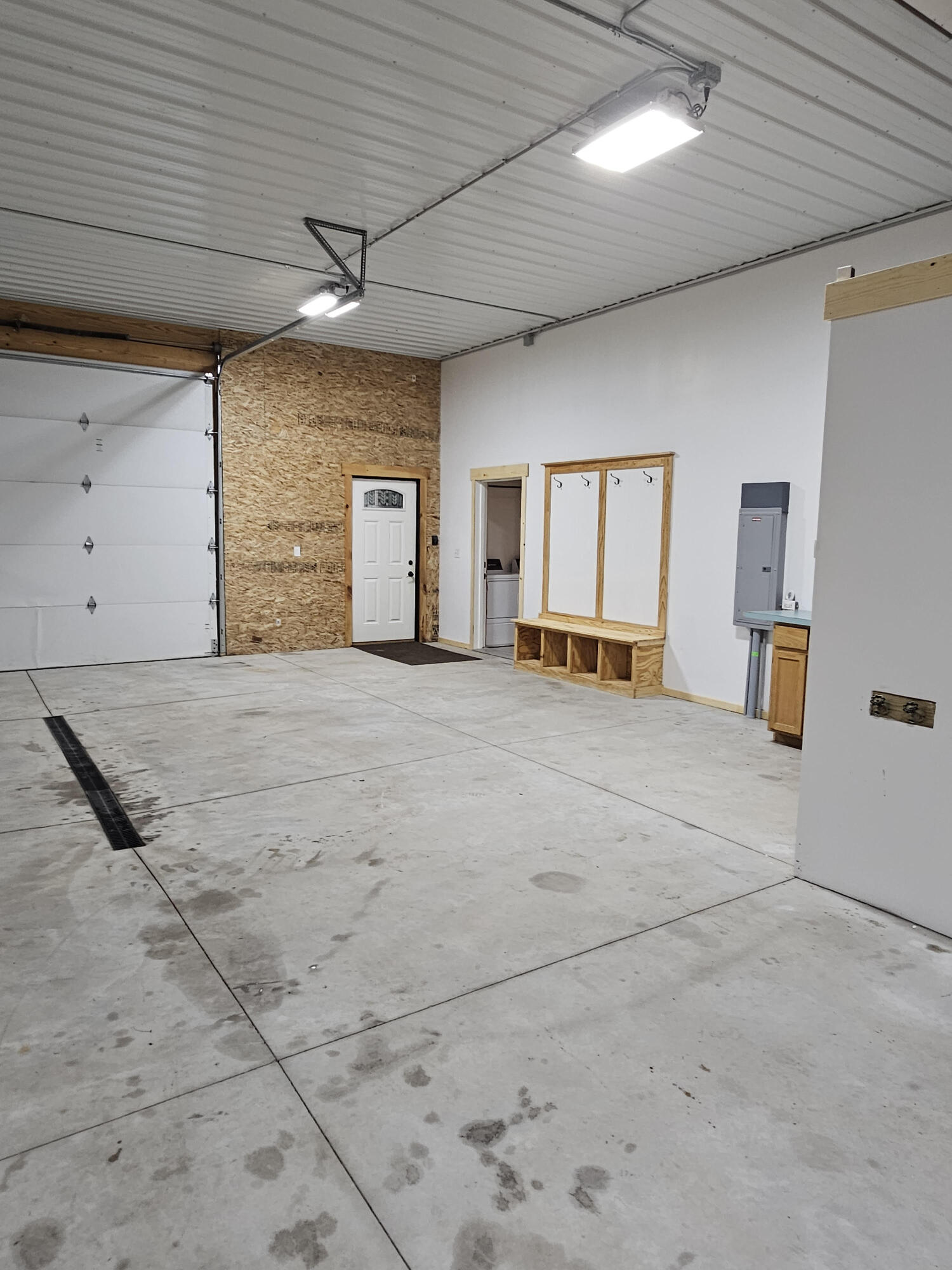 11122 Evergreen Road Gowen, MI 49326 - Photo 43 of 44 garge to door & house
