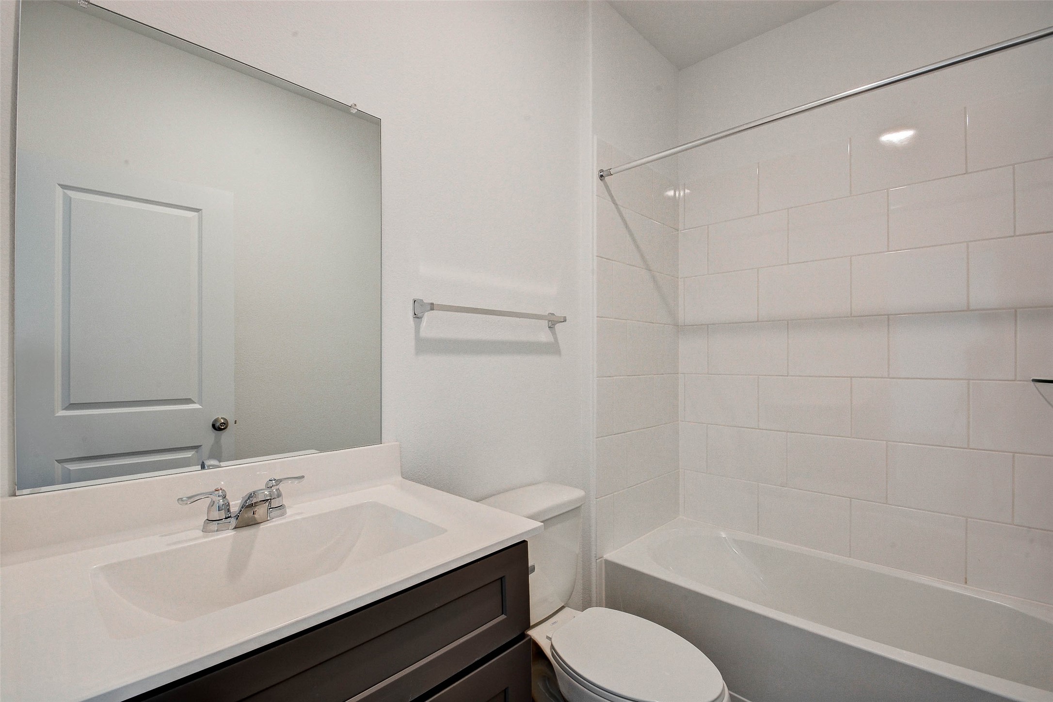 16642 Teak Mantle Road Conroe, TX 77302 - Photo 18 of 35 a bathroom with a sink toilet and shower