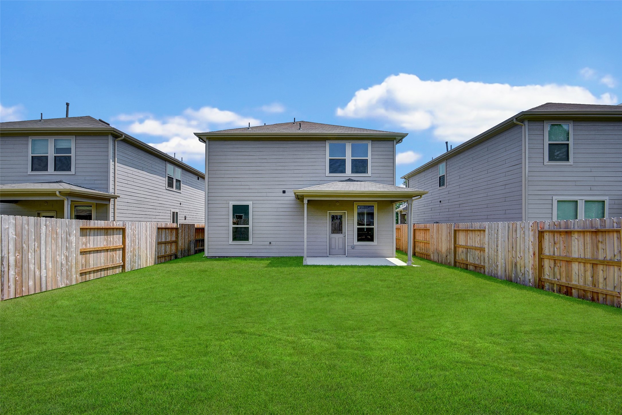 16642 Teak Mantle Road Conroe, TX 77302 - Photo 20 of 35 a view of an house with backyard and a tree