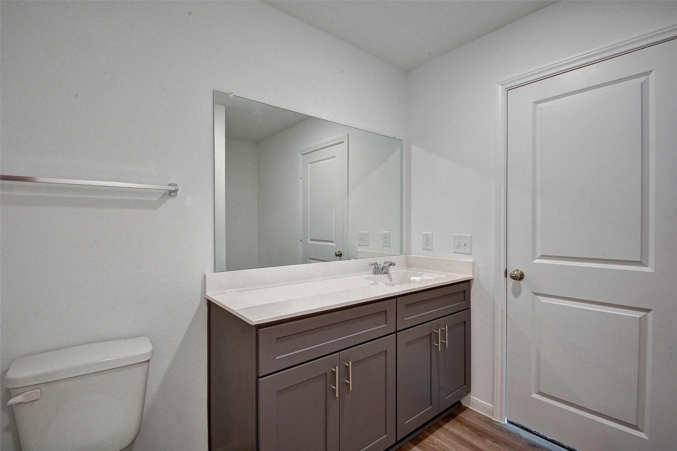 16642 Teak Mantle Road Conroe, TX 77302 - Photo 22 of 35 a bathroom with a granite countertop sink toilet and mirror
