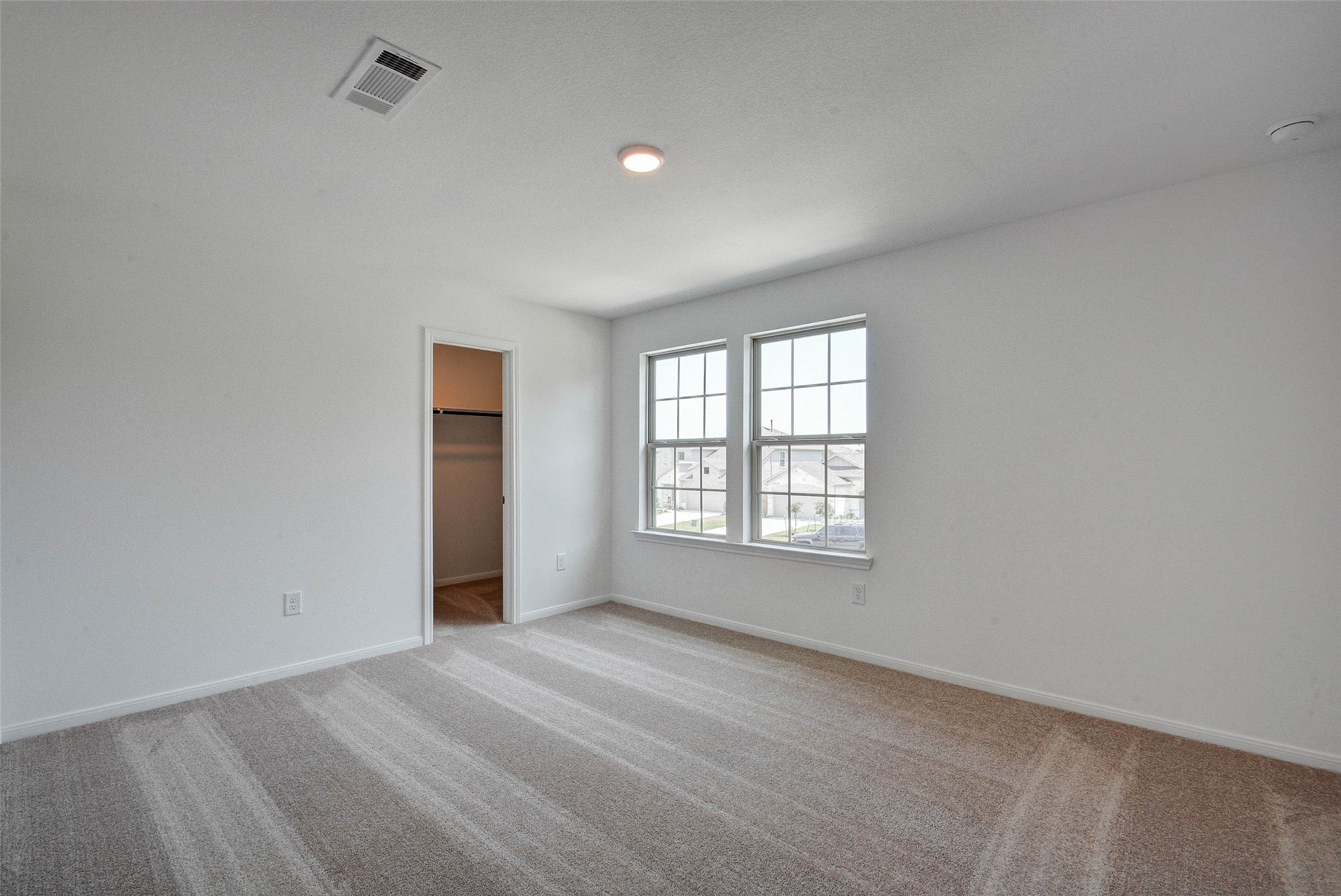 16642 Teak Mantle Road Conroe, TX 77302 - Photo 30 of 35 an empty room with a window