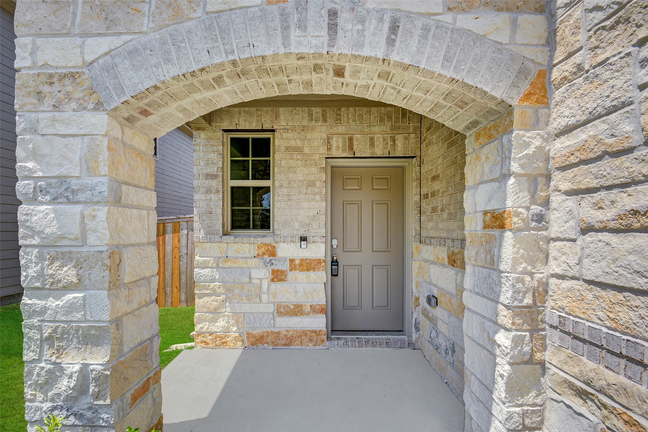 16642 Teak Mantle Road Conroe, TX 77302 - Photo 4 of 35 a large stone building with a door