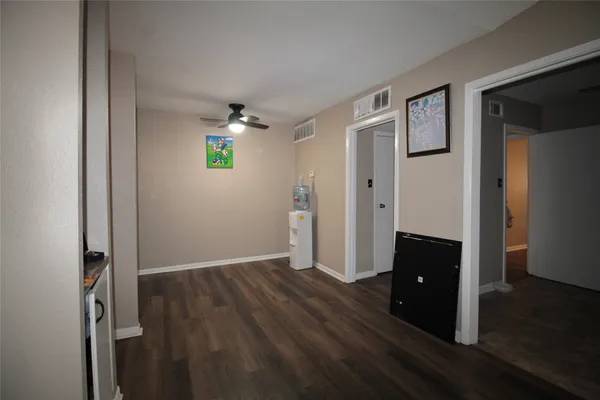 wooden floor and window in an empty room
