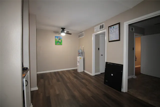 wooden floor and window in an empty room