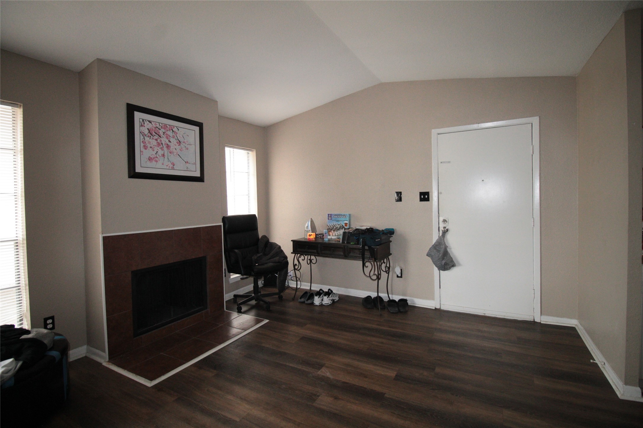 10912 Gulf Freeway, Unit 22 Houston, TX 77075 - Photo 3 of 28 a view of a livingroom with furniture and a fireplace