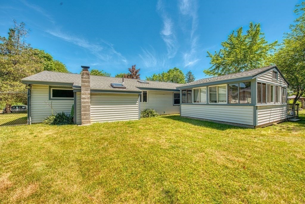 81 Errol Road Brockton, MA 02302 - Photo 5 of 31 a view of a house with a backyard