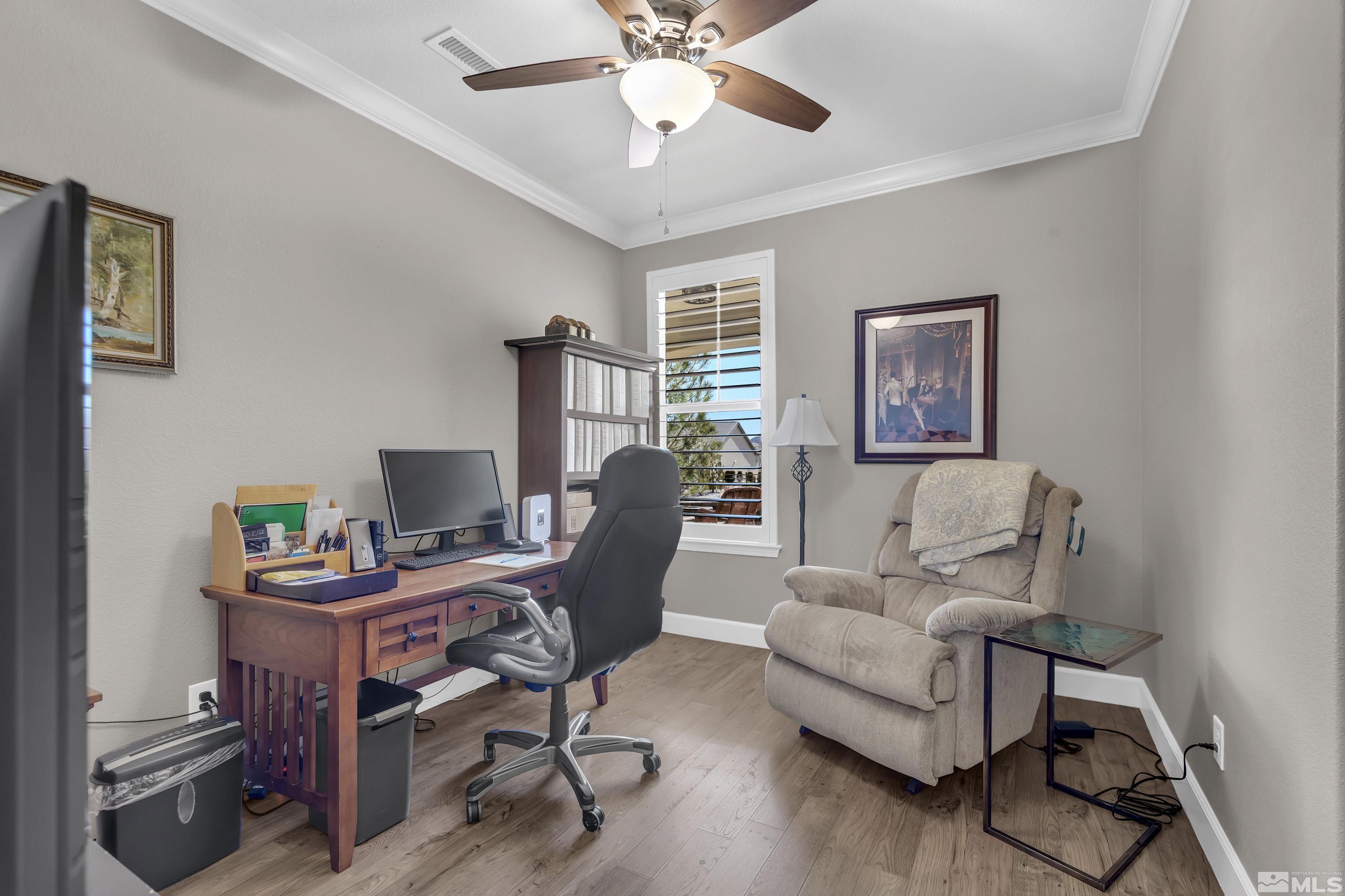 9255 Sassafras Trail Reno, NV 89523 - Photo 19 of 25 a view of a workspace with furniture and a window