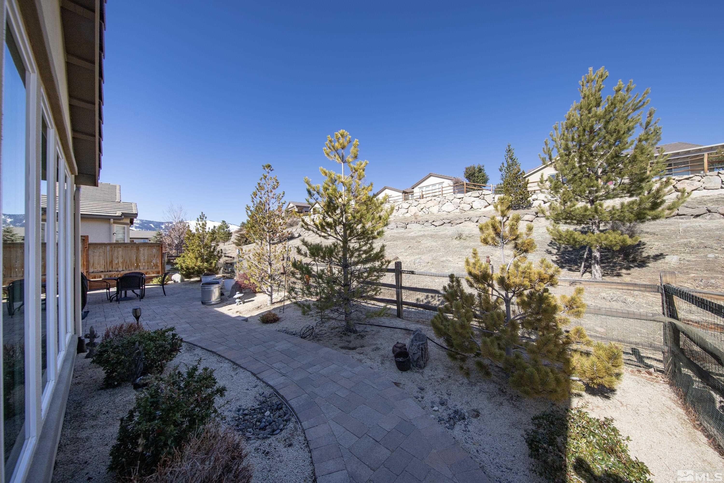 9255 Sassafras Trail Reno, NV 89523 - Photo 24 of 25 a view of a yard with cars parked