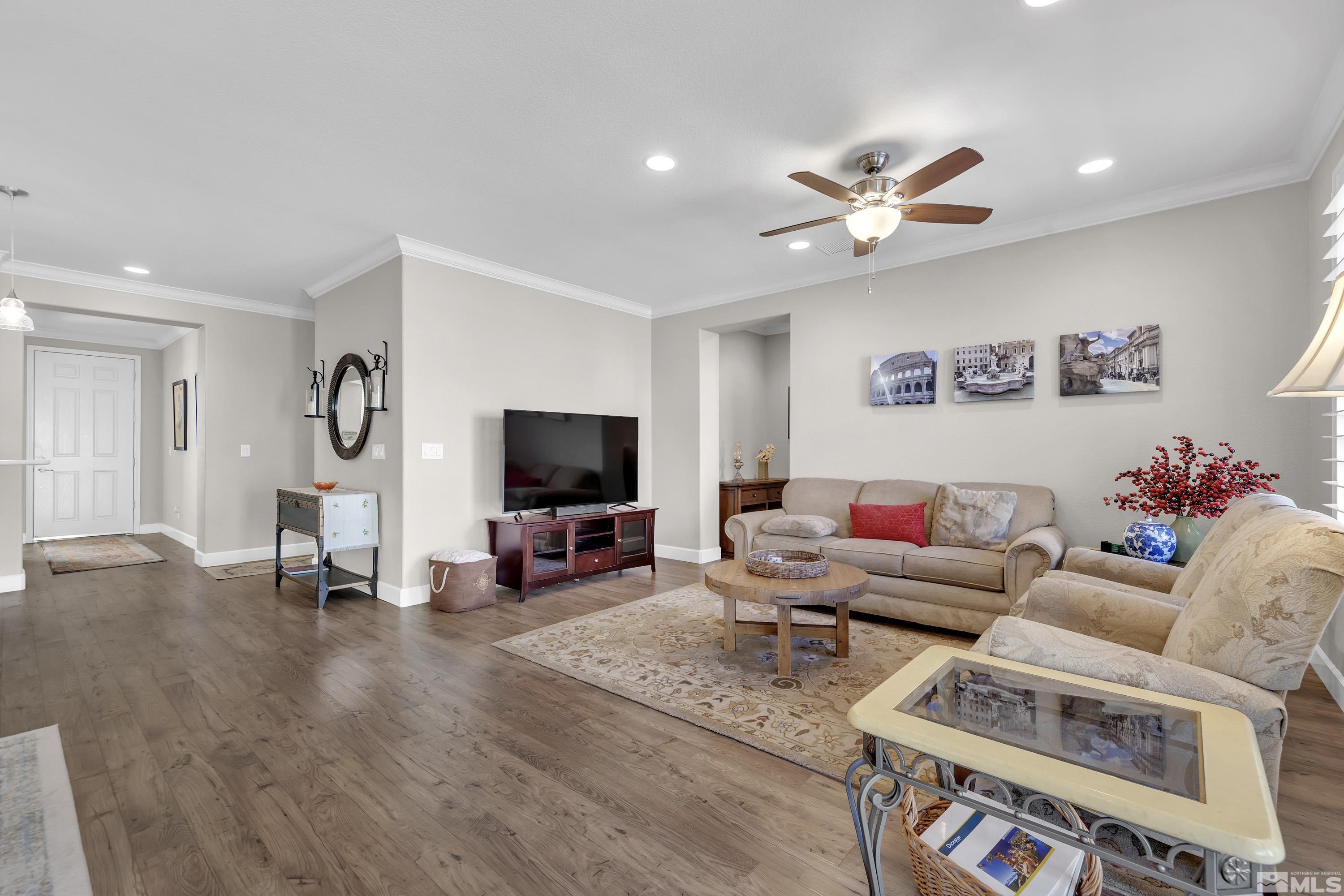 9255 Sassafras Trail Reno, NV 89523 - Photo 4 of 25 a living room with furniture and a flat screen tv
