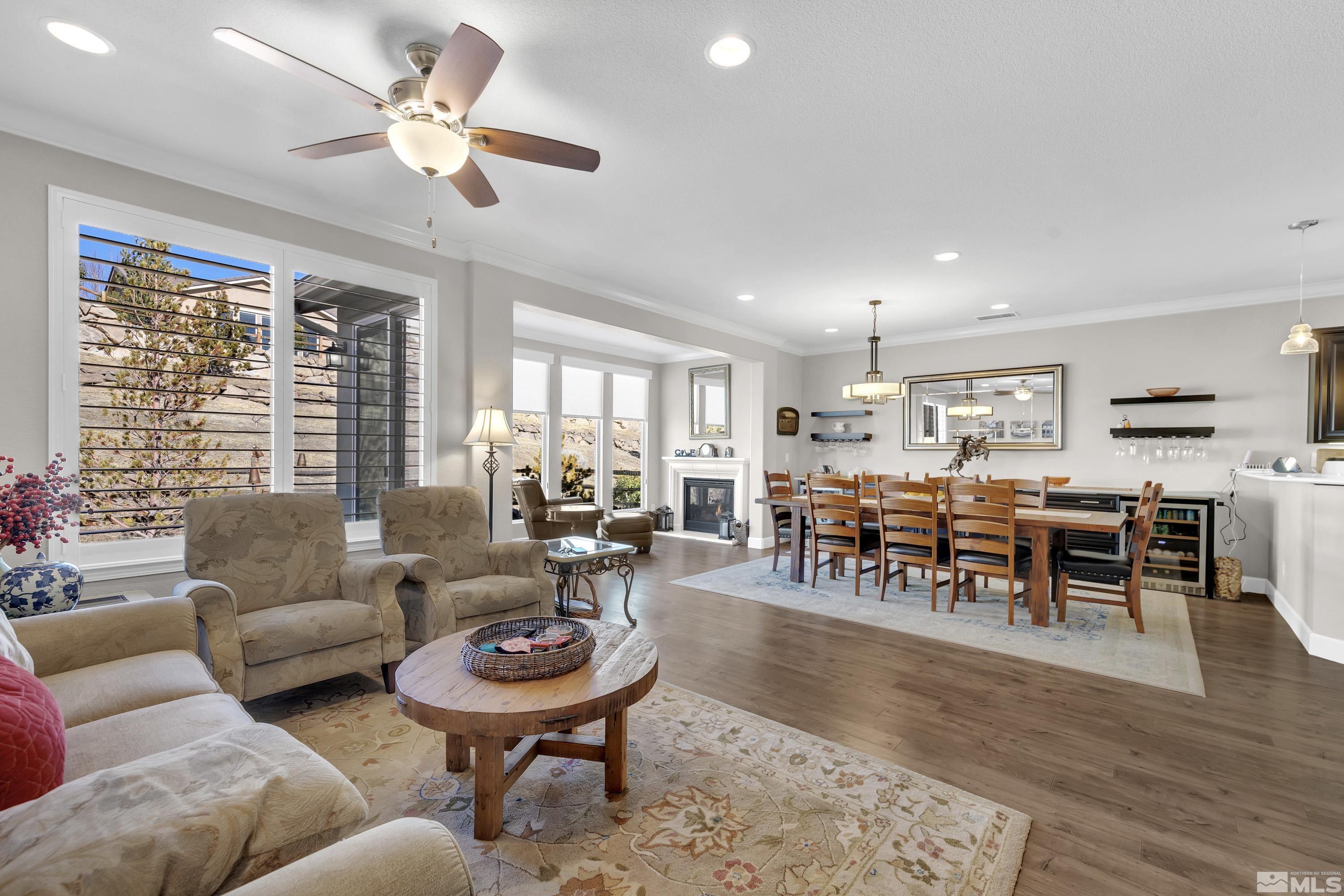 9255 Sassafras Trail Reno, NV 89523 - Photo 6 of 25 a living room with furniture kitchen view and a large window